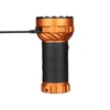 Orange Marauder 3 tactical flashlight with black textured grip charging via USB-C cable on white background