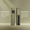 Olight Olive Green Arkfeld Ultra EDC Flashlight and Laser Pointer, front and back view with textured body and pocket clip, for outdoor and urban use.