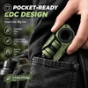 GoBigger green EDC pocket tool sliding into a black jeans pocket, showcasing compact size and lightweight design.