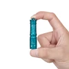 Olight I3E EOS Teal flashlight held by fingers with star pattern for daily keychain light