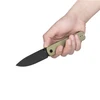 Hand holding an EDC pocket knife with a black blade and textured olive green handle.