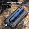 Olight Blue Warrior Ultra Flashlight with Magnetic Charging Cable on a Solar Power Bank for Outdoor Use