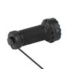 Black flashlight with textured grip and blue head, charging via a cable from the tailcap.