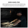 Olight orange ArkPro Lite magnetic work light attached to car hood for hands-free vehicle maintenance.