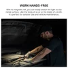 Olight ArkPro Lite magnetic work light attached under car hood for hands-free vehicle maintenance.