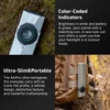 Olight ArkPro Ultra slim portable EDC flashlight with color coded indicators clipped on a brown outdoor backpack