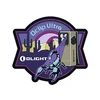 Olight Oclip Ultra patch featuring desert, scorpion, and tactical clip flashlight.
