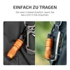 Orange Imini 2 flashlight attached to a keychain and car key, ready for quick use.