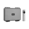 Olight Arkfeld Pro flat flashlight in silver next to its grey protective hard carrying case on a white background