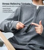 Person using a stress-relieving ratchet phone case kickstand for ASMR sounds during a work break.