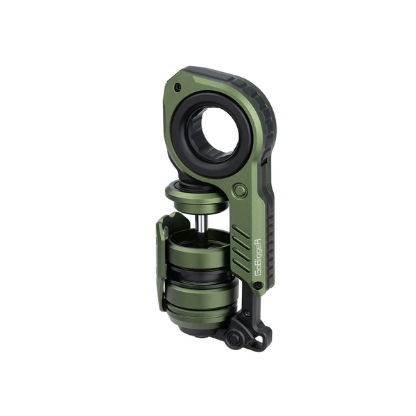 GoBigger green mechanical fidget toy with metallic piston and rotating ring on white background