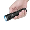 Olight black Seeker 4 Pro flashlight held in hand with blue bezel for illumination.