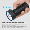 Hand holding a black flashlight with smart lockout feature, unlocking by rotating the knob more than 60 degrees.