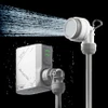 Flextail portable camp shower system spraying water against a black background