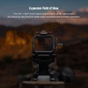 Red dot sight with 1.10 by 0.87 inch multi-coated window showing field of view dimensions over blurred outdoor landscape