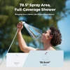 Man using a Flextail portable outdoor shower with 78.5 square centimeter full-coverage spray area.