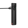 Olight Arkfeld Pro flat flashlight charging via USB-C cable on white background