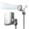 Flextail portable camp shower with water pump and spraying shower head on white background